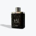 Oud Najdia Lattafa edp black silver cap white background closeup view
