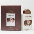 Lattafa Pride Vintage Radio perfume packaging in brown colour on white background closeup view side angle