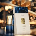 Al Nashama Caprice Lattafa dark blue gold edp bottles and boxes