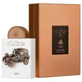La Collection 1886 Car Lattafa Pride edp packaging beside white display case side angle