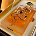 Tharwah Gold Lattafa Pride edp orange gradient glass packaging unboxed closeup