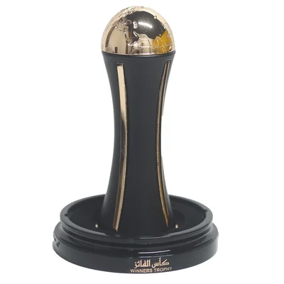 Lattafa Pride Al Khas Winners Trophy Gold 100ml — A dark blue box with gold text and a matching dark blue and gold globe-topped perfume bottle, displayed against a white background. | Lattafa Pride Al Khas Winners Trophy Gold 100ml — Kotak biru gelap dengan teks emas dan botol minyak wangi bertopi dunia biru gelap dan