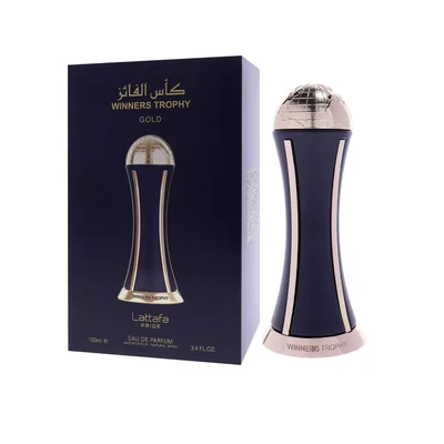 Lattafa Pride Al Khas Winners Trophy Gold 100ml — A dark blue box with gold text and a matching dark blue and gold globe-topped perfume bottle, displayed against a white background. | Lattafa Pride Al Khas Winners Trophy Gold 100ml — Kotak biru gelap dengan teks emas dan botol minyak wangi bertopi dunia biru gelap dan