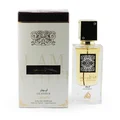 Lattafa Ana Abiyedh Leather 60ml — White perfume box and glass bottle with gold accents and Arabic calligraphy, showing the product packaging and bottle design. | Kotak minyak wangi putih dan botol kaca dengan aksen emas dan kaligrafi Arab, menunjukkan pembungkusan produk dan reka bentuk botol.