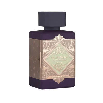 Lattafa Bade'e Al Oud Amethyst Fusion 100ml — A purple perfume bottle with a dark grey cap and a gold and light green geometric label. | Lattafa Bade'e Al Oud Amethyst Fusion 100ml — Botol minyak wangi ungu dengan penutup kelabu gelap dan label geometri emas dan hijau muda.