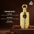 Lattafa Bayaan Eau De Parfum 100ml by Lattafa — A golden perfume bottle with intricate Arabic calligraphy design, presented in a white box with a matching golden outer sleeve featuring similar calligraphy. | Lattafa Bayaan Eau De Parfum 100ml by Lattafa — Botol minyak wangi emas dengan reka bentuk kaligrafi Arab yang