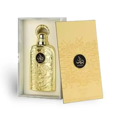 Lattafa Bayaan Eau De Parfum 100ml by Lattafa — A golden perfume bottle with intricate Arabic calligraphy design, presented in a white box with a matching golden outer sleeve featuring similar calligraphy. | Lattafa Bayaan Eau De Parfum 100ml by Lattafa — Botol minyak wangi emas dengan reka bentuk kaligrafi Arab yang