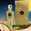 Lattafa Bayaan Eau De Parfum 100ml by Lattafa — A golden perfume bottle with intricate Arabic calligraphy design, presented in a white box with a matching golden outer sleeve featuring similar calligraphy. | Lattafa Bayaan Eau De Parfum 100ml by Lattafa — Botol minyak wangi emas dengan reka bentuk kaligrafi Arab yang