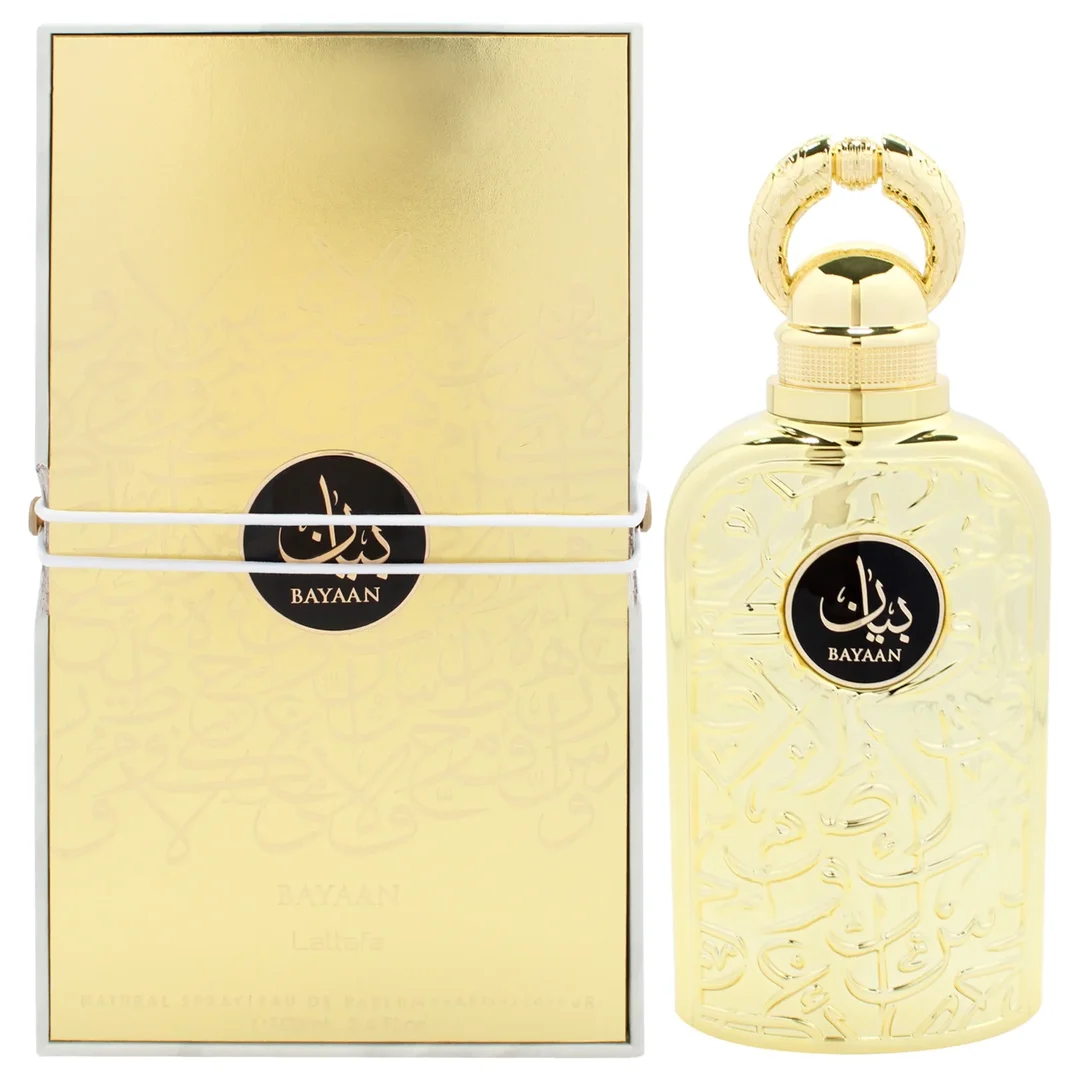 Lattafa Bayaan Eau De Parfum 100ml by Lattafa — A golden perfume bottle with intricate Arabic calligraphy design, presented in a white box with a matching golden outer sleeve featuring similar calligraphy. | Lattafa Bayaan Eau De Parfum 100ml by Lattafa — Botol minyak wangi emas dengan reka bentuk kaligrafi Arab yang