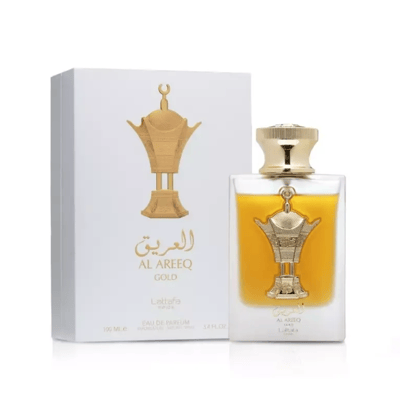 Al Areeq Gold Lattafa Pride edp botol emas latar putih dekat kotak