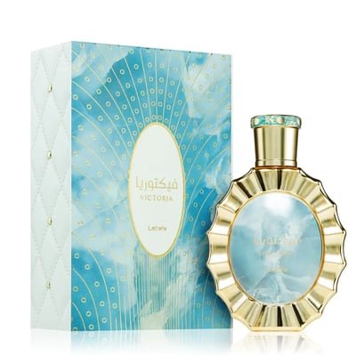 Victoria Lattafa golden edp, botol kaca biru, latar putih dekat sisi