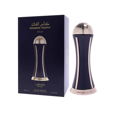 Lattafa Pride Al Khas Winners Trophy Gold 100ml — A dark blue box with gold text and a matching dark blue and gold globe-topped perfume bottle, displayed against a white background. | Lattafa Pride Al Khas Winners Trophy Gold 100ml — Kotak biru gelap dengan teks emas dan botol minyak wangi bertopi dunia biru gelap dan