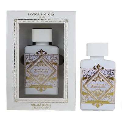 Badee Al Oud Honor Glory Lattafa white bottles packaging plain background closeup