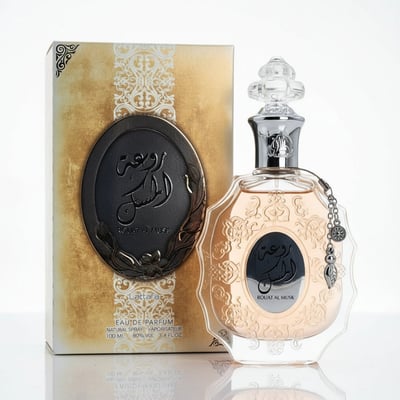 Lattafa Rouat Al Musk glass bottle decoration with white gold minimalist elegant box