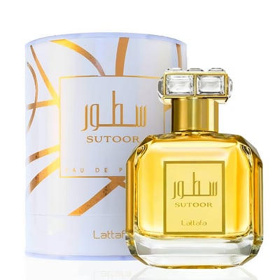 Sutoor Lattafa edp women gold elegant glass bottles next white packaging boxes closeup