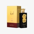 Ansaam Gold Lattafa Pride edp black elegant packaging beside golden gift box closeup