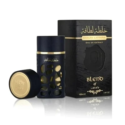 Lattafa Khalta Blend Of Lattafa Eau De Parfum 100ml — A dark blue perfume bottle with a textured, carved outer layer revealing gold accents inside, next to its matching cap with a gold circular emblem. | Lattafa Khalta Blend Of Lattafa Eau De Parfum 100ml — Botol minyak wangi biru gelap dengan lapisan luar bertekstur