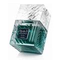 Lattafa Khamrah Waha Lattafa Perfumes 100ml EDP — A clear glass perfume bottle with a textured cap sits next to its blue