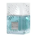 Lattafa Khamrah Waha Lattafa Perfumes 100ml EDP — A clear glass perfume bottle with a textured cap sits next to its blue