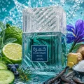 Lattafa Khamrah Waha Lattafa Perfumes 100ml EDP — A clear glass perfume bottle with a textured cap sits next to its blue