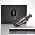 Niche Emarati Khanjar by Niche Emarati 85ml EDP — Black box with silver label and ornate dagger-shaped perfume bottle