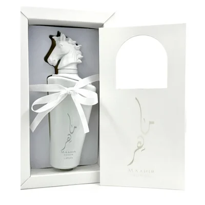 Lattafa Maahir Honor 100ml by Lattafa — White perfume bottle with a horse head stopper, tied with a white ribbon, inside an open white box with a cutout flap | Lattafa Maahir Honor 100ml by Lattafa — Botol minyak wangi putih dengan penutup kepala kuda, diikat dengan reben putih, di dalam kotak putih terbuka dengan