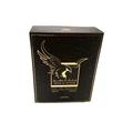 Lattafa Malik Al Tayoor Concentrated 100ml — Black perfume bottle with gold cap and eagle emblem, next to its black and gold patterned box with matching emblem. | Lattafa Malik Al Tayoor Concentrated 100ml — Botol minyak wangi hitam dengan penutup emas dan lambang helang, bersebelahan kotak corak hitam dan emasnya