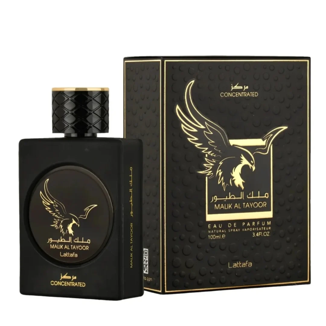 Lattafa Malik Al Tayoor Concentrated 100ml — Black perfume bottle with gold cap and eagle emblem, next to its black and gold patterned box with matching emblem. | Lattafa Malik Al Tayoor Concentrated 100ml — Botol minyak wangi hitam dengan penutup emas dan lambang helang, bersebelahan kotak corak hitam dan emasnya