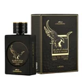 Lattafa Malik Al Tayoor Concentrated 100ml — Black perfume bottle with gold cap and eagle emblem, next to its black and gold patterned box with matching emblem. | Lattafa Malik Al Tayoor Concentrated 100ml — Botol minyak wangi hitam dengan penutup emas dan lambang helang, bersebelahan kotak corak hitam dan emasnya