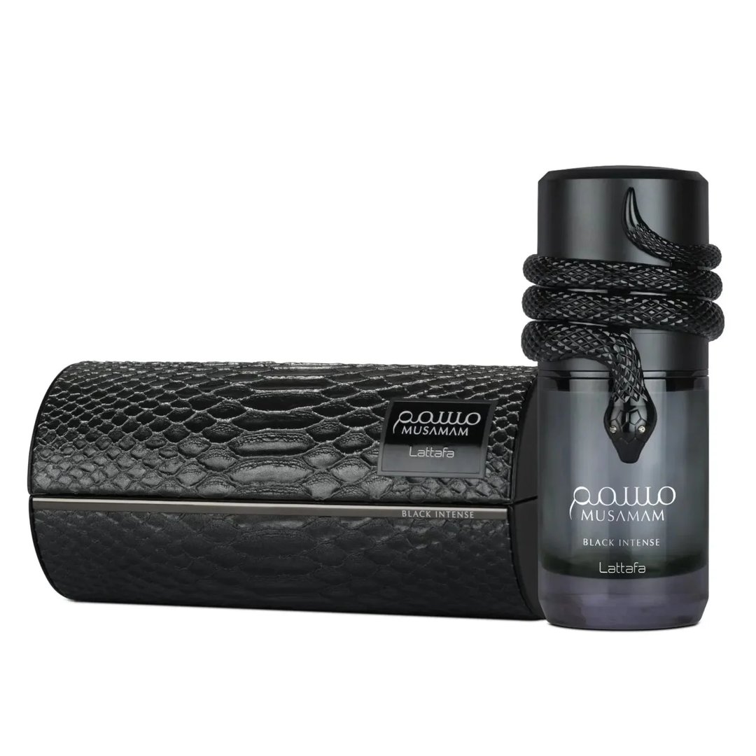 Lattafa Musamam Black Intense 100ml by Lattafa — Black snake coiled around a dark perfume bottle, with a textured black case in the background. | Lattafa Musamam Black Intense 100ml by Lattafa — Ular hitam melilit botol minyak wangi gelap, dengan bekas bertekstur hitam di latar belakang.