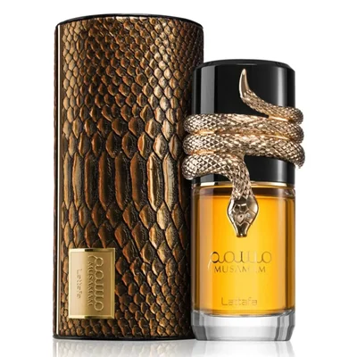 Lattafa Musamam Eau De Parfum 100ml by Lattafa — A golden snake coils around a clear glass perfume bottle filled with amber liquid, next to a textured brown cylindrical case with a snake-skin pattern. | Lattafa Musamam Eau De Parfum 100ml by Lattafa — Ular emas melilit botol minyak wangi kaca jernih berisi cecair