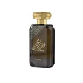 Lattafa Musk Al Aroos — A dark blue perfume bottle with gold Arabic calligraphy and 'MUSK AL AROOS LATTAFA' text, presented in an open dark blue gift box with a black velvet insert. | Lattafa Musk Al Aroos — Botol minyak wangi biru gelap dengan kaligrafi Arab emas dan teks 'MUSK AL AROOS LATTAFA', dipersembahkan dalam