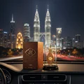 Afaq Gold Lattafa edp on car dashboard kuala lumpur city night skyline