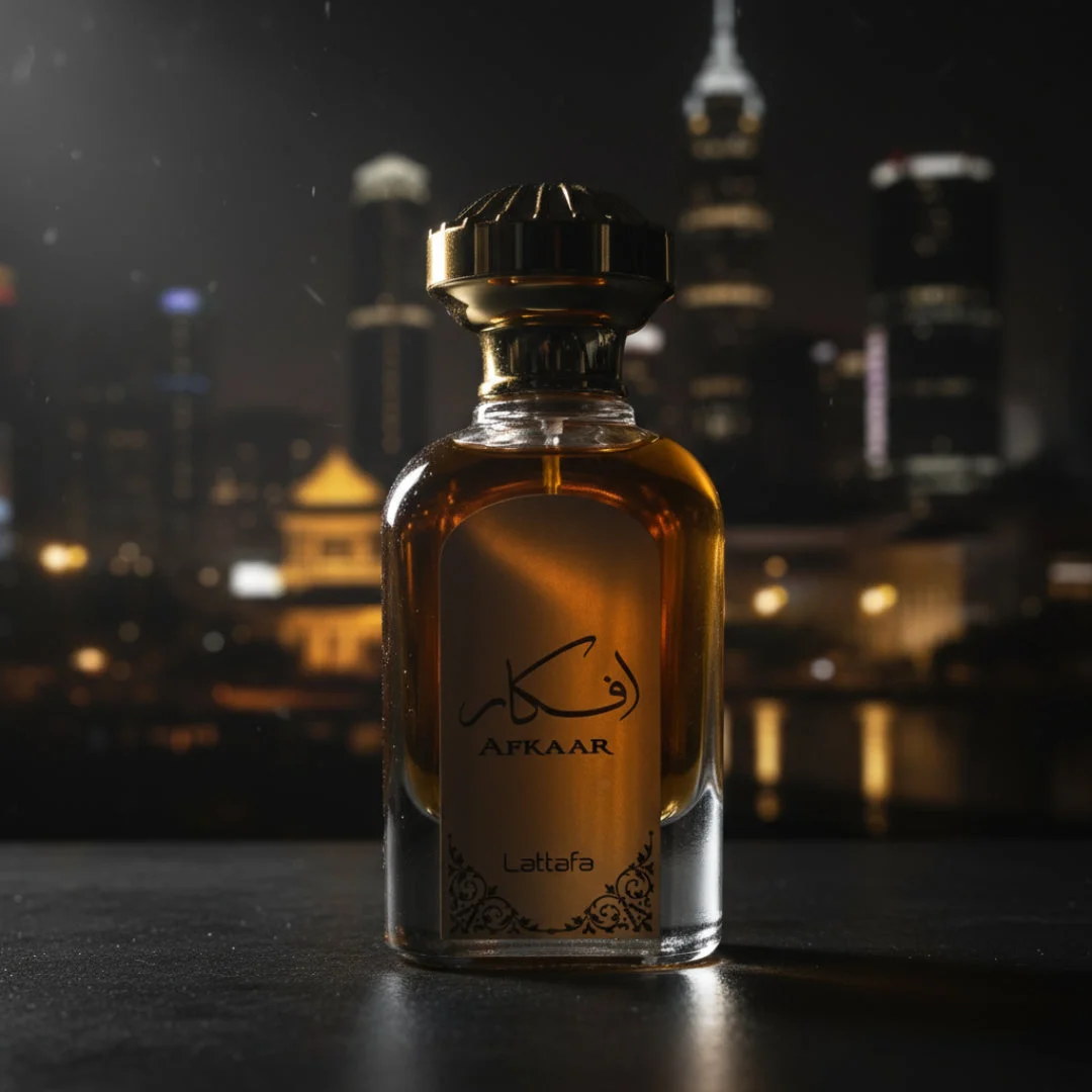Afkaar Lattafa edp glass bottle golden liquid closeup night urban background