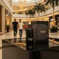Ajayeb Dubai Lattafa edp on display in shopping mall setting closeup