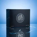 Al Dur Al Maknoon Silver Lattafa edp packaging reflective surface blue background closeup
