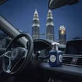 Al Ameed Lattafa edp on car dashboard kuala lumpur city night side view