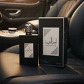 Ameer Al Arab Asdaaf edp men black packaging on car seat closeup view