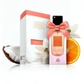 Ana Abiyedh Coral Lattafa edp surrounded white flowers orange slice coconut half pink box
