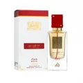 Ana Abiyedh Rouge Lattafa edp glass sprayer red cap beside white packaging box