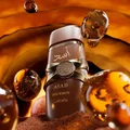 Asad Bourbon Lattafa edp men brown glass bottles surrounded closeup view