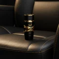 Asad Lattafa edp black cylindrical bottle on chair gold accents