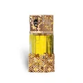 Atheeri Lattafa women yellow liquid honeycomb patterned gold glass bottle closeup front
