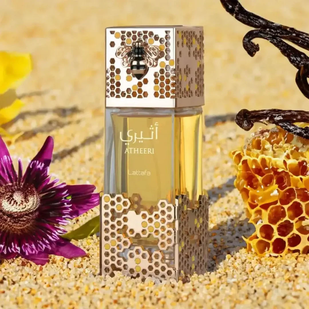 Atheeri Lattafa women fragrance honeycomb packaging surrounded purple flower vanilla beans