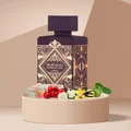 Badee Al Oud Amethyst Lattafa unisex fragrance bottle flowers and fruits
