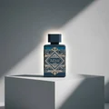 Badee Al Oud for Glory Lattafa edp blue glass packaging on white block display