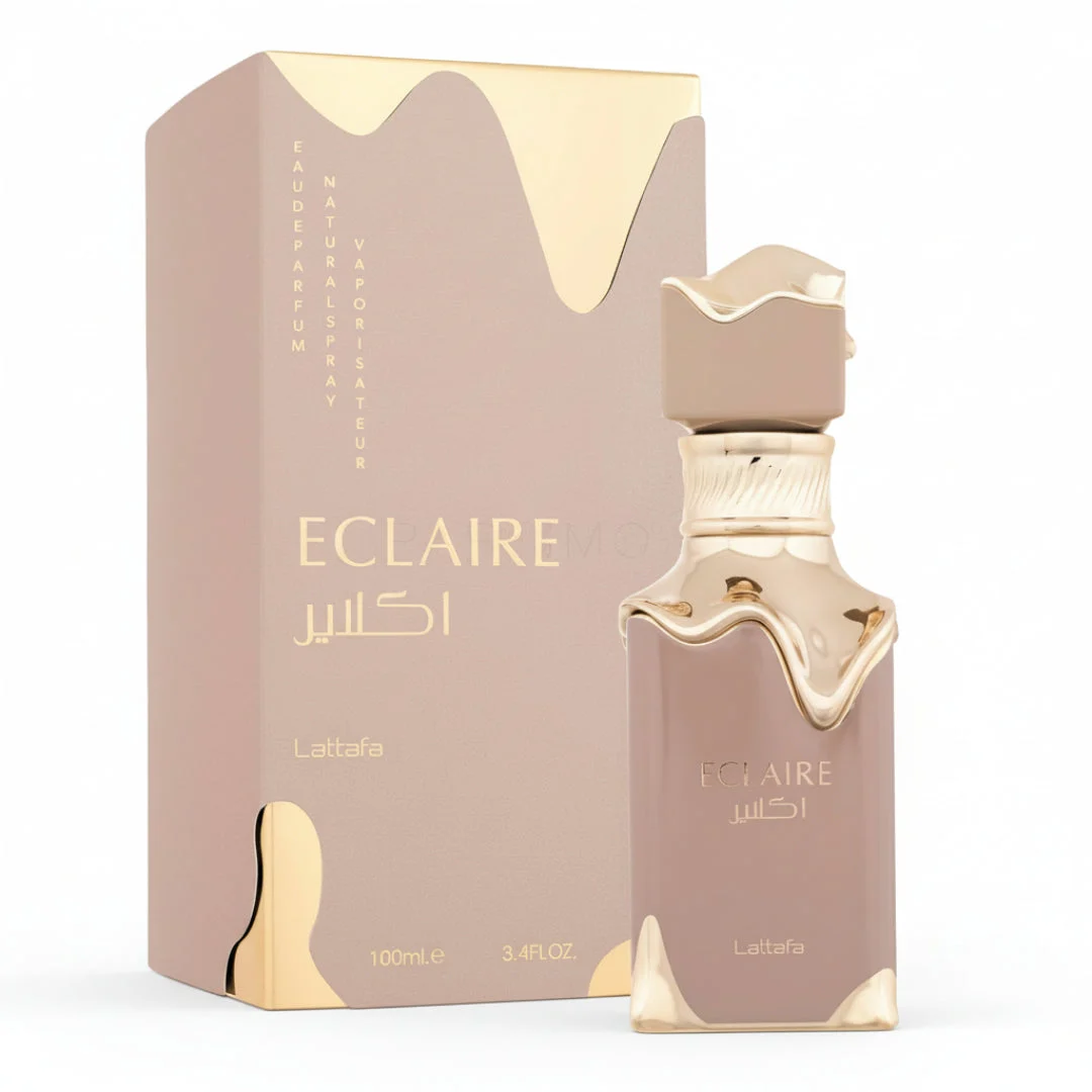 Eclaire Lattafa edp women fragrance pinkish gold packaging white background closeup