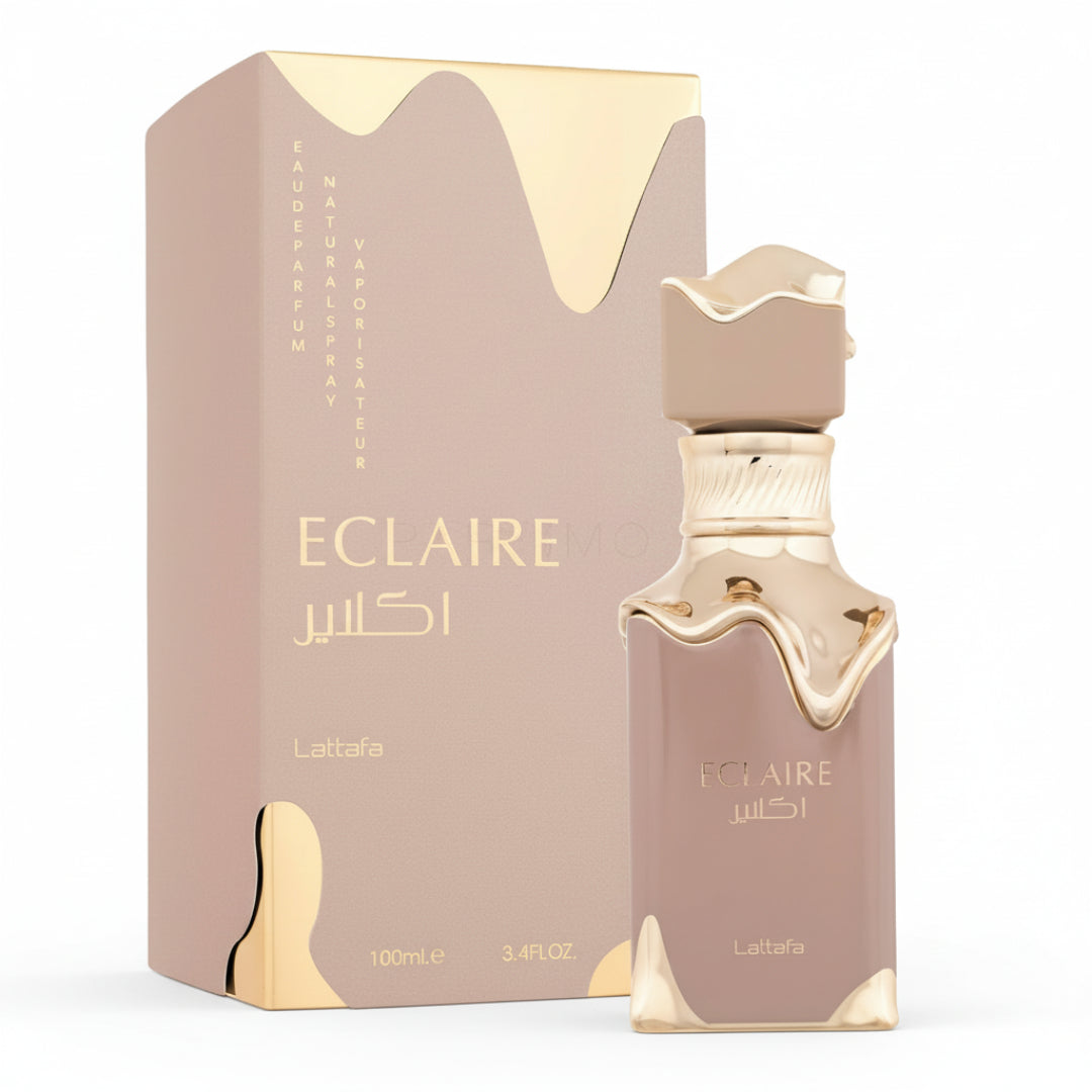 Eclaire Lattafa edp women fragrance pinkish gold packaging white background closeup