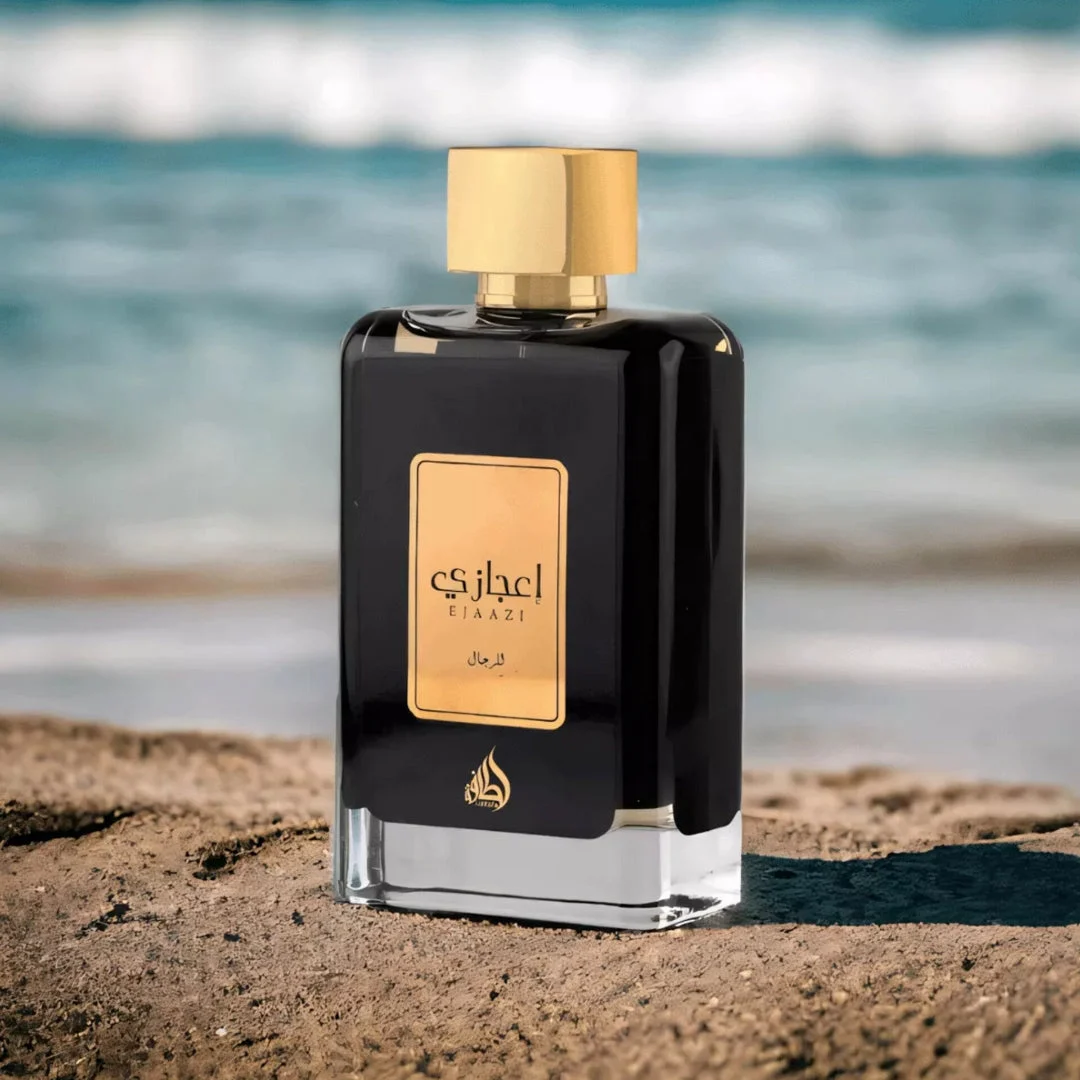 Ejaazi Lattafa black rectangular glass cologne men gold cap beach sand ocean