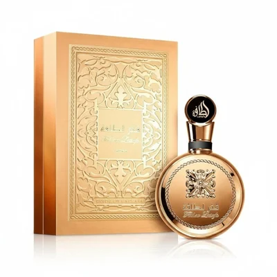 Fakhar Extrait Lattafa men fragrance gold packaging white background closeup side angle